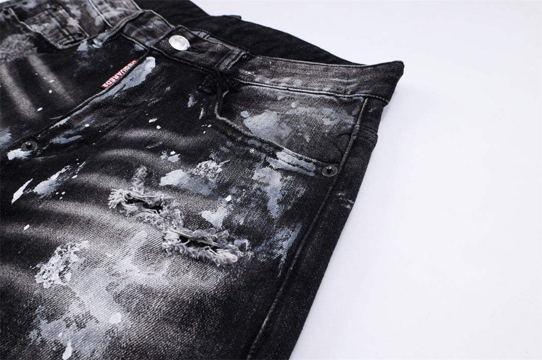 SOLA-DSQ2 New Ink Splash Man Hole Jeans