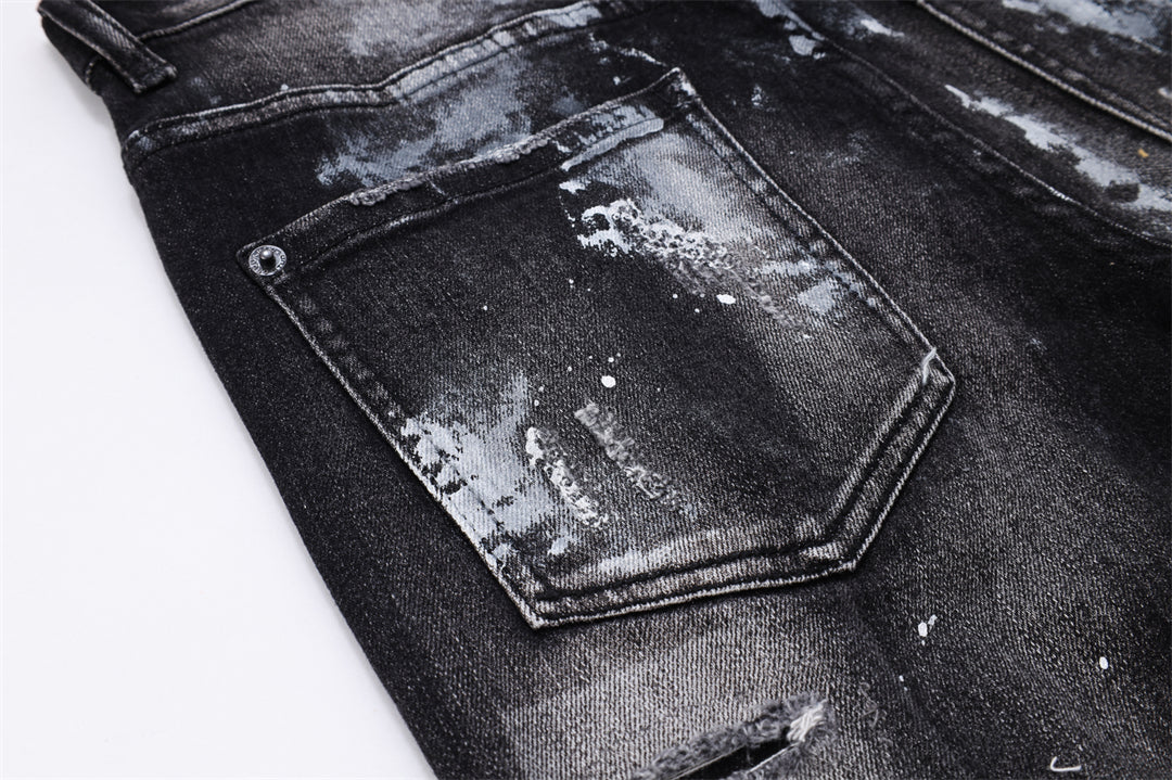 SOLA-DSQ2 New Ink Splash Man Hole Jeans